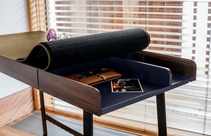 ... offers elegant storage space under the table top