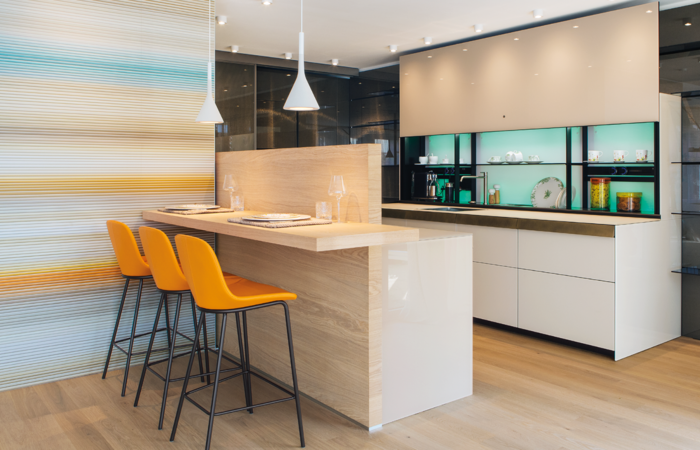 The wardrobe is located behind the customised sliding doors in the entrance area